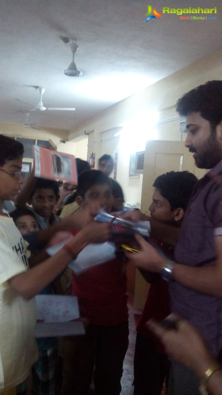 Madhumitha, Sivabalaji with their son Dhanvin at Ashray Akruti