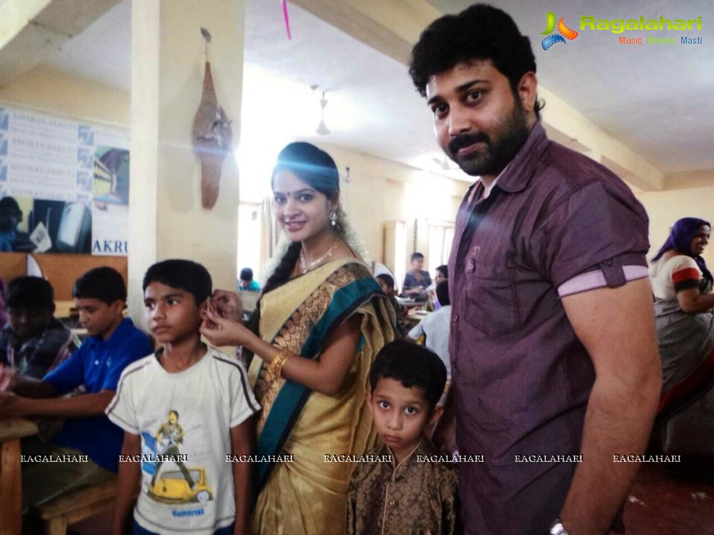 Madhumitha, Sivabalaji with their son Dhanvin at Ashray Akruti