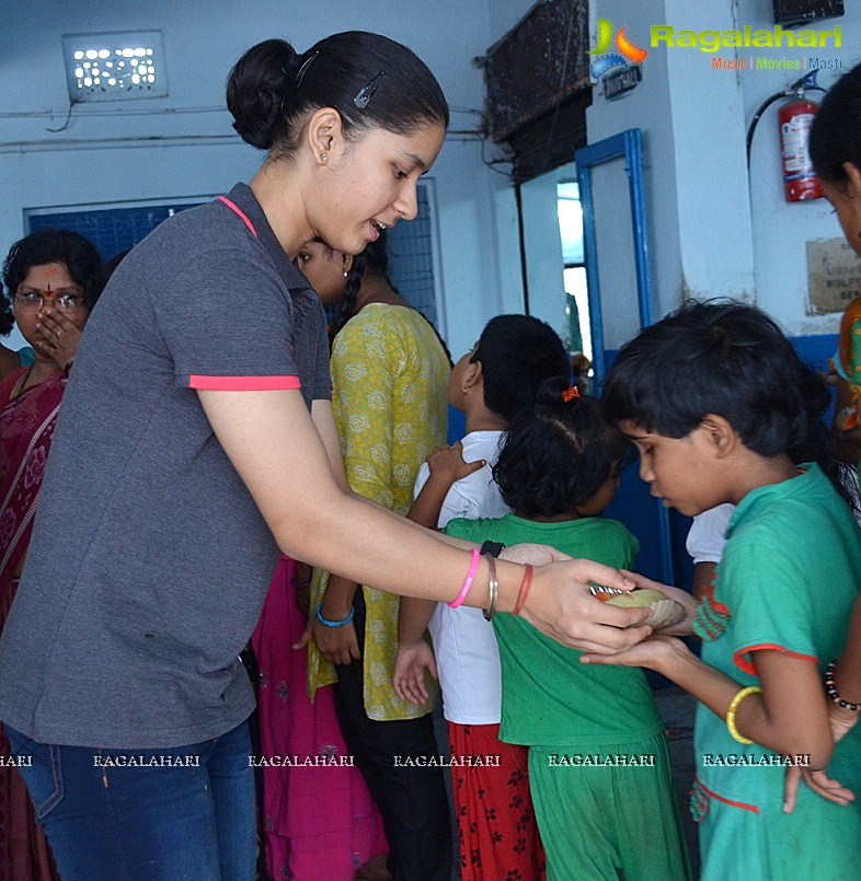 Naina Jaiswal distribution of Fruits and Biscuits to Devnar Blind Students