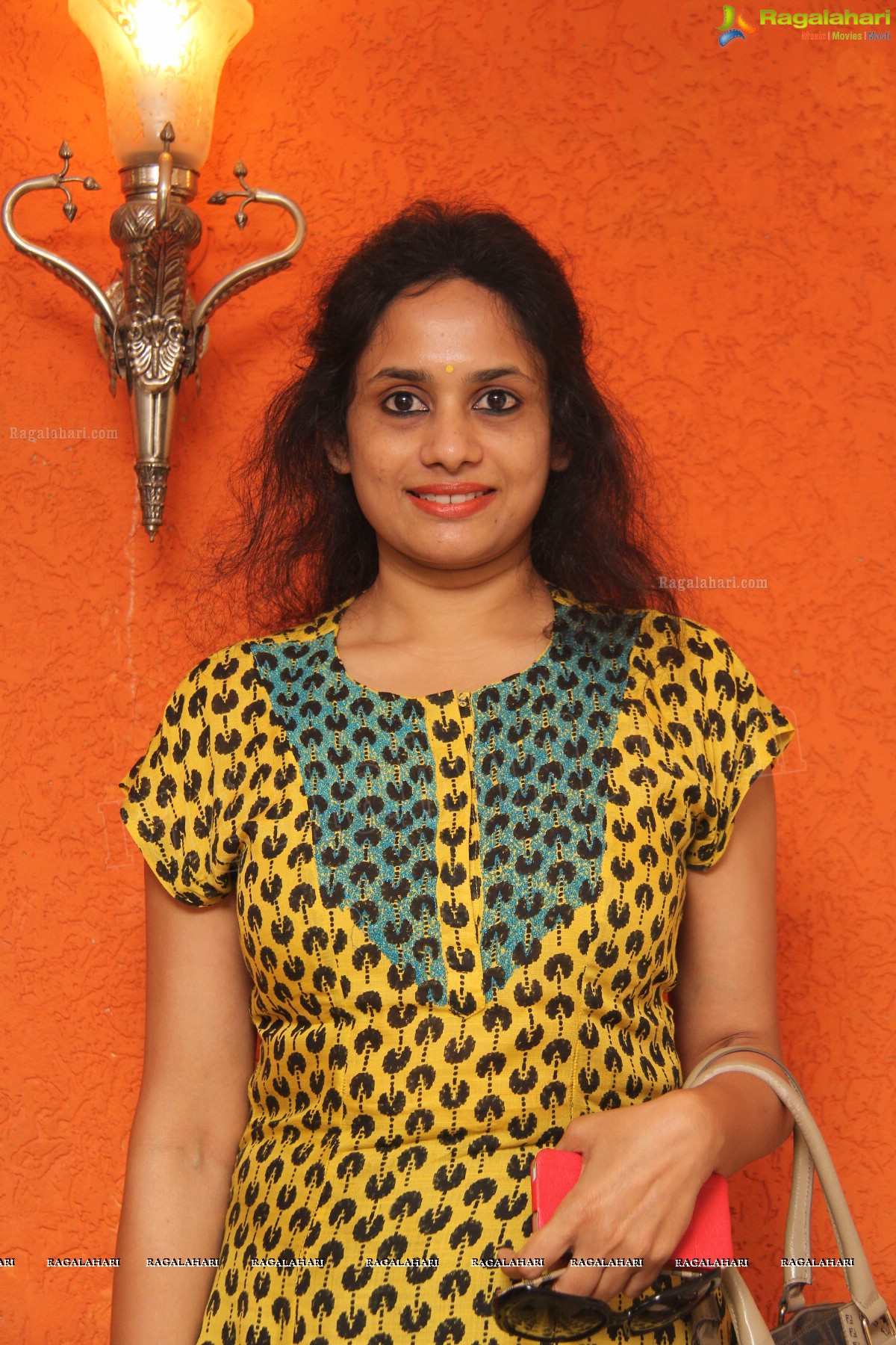 Orange Feathers 'Wintry Chat-Pat Morning' by Usha Badruka & Aarti Badruka