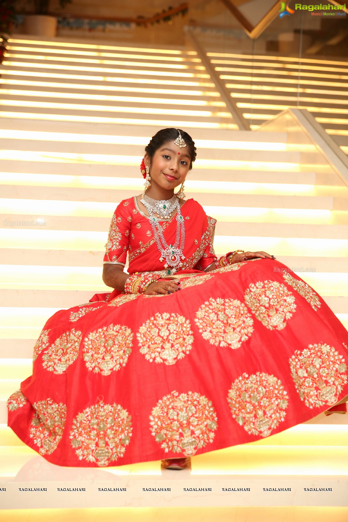 Kaushika Kondragunta’s Magnificent Half Saree Ceremony at Hotel Trident, Madhapur