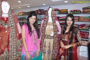 Annie and Kushboo at Paree Suits and Sarees Curtain Raiser Photos