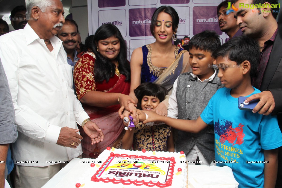 Sanjana Galrani inaugurates Naturals Family Salon at Kukatpally, Hyderabad