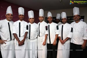 Synergy Group Cake Mixing Event at Taj Vivanta