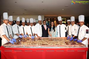 Synergy Group Cake Mixing Event at Taj Vivanta