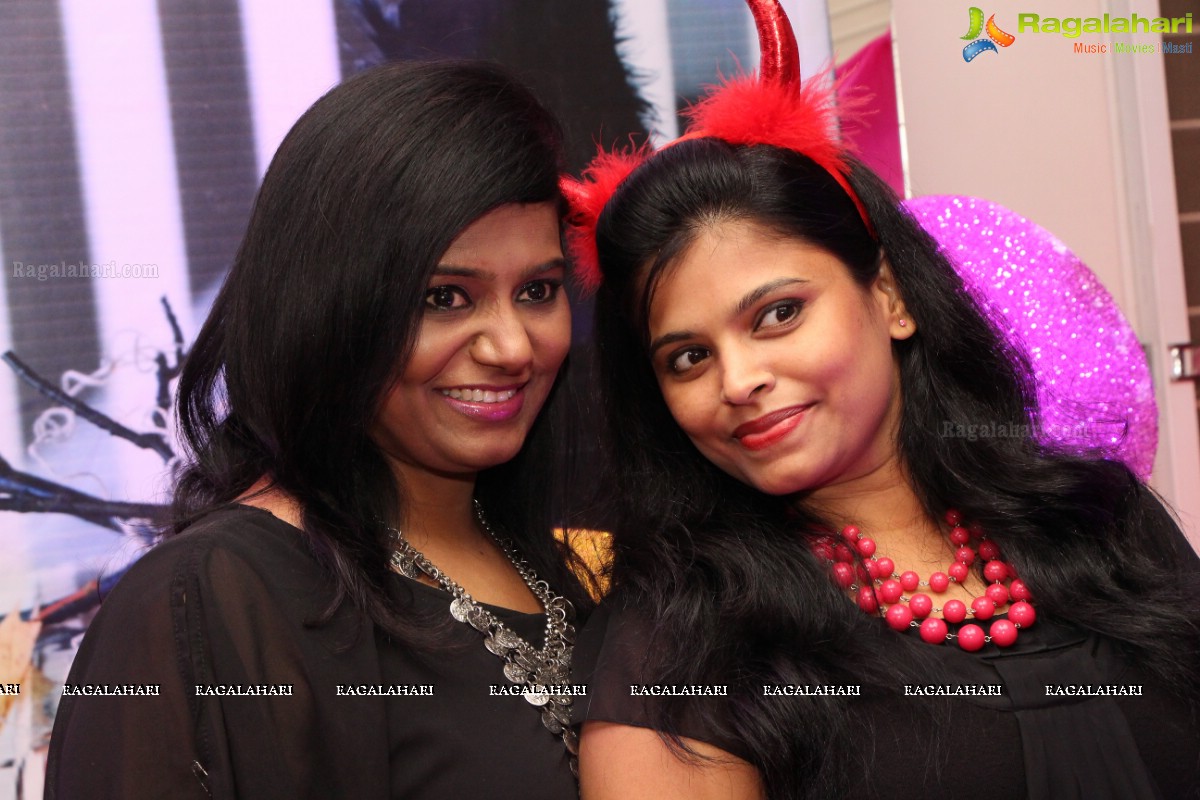 Glamorous Pink and Black Halloween Night by Madan and Preethi Rao, Hyderabad