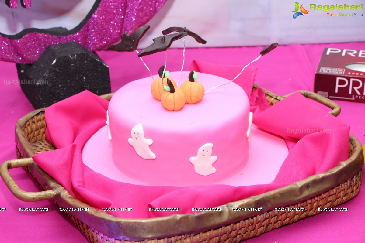 Glamorous Pink and Black Halloween Night by Madan and Preethi Rao, Hyderabad