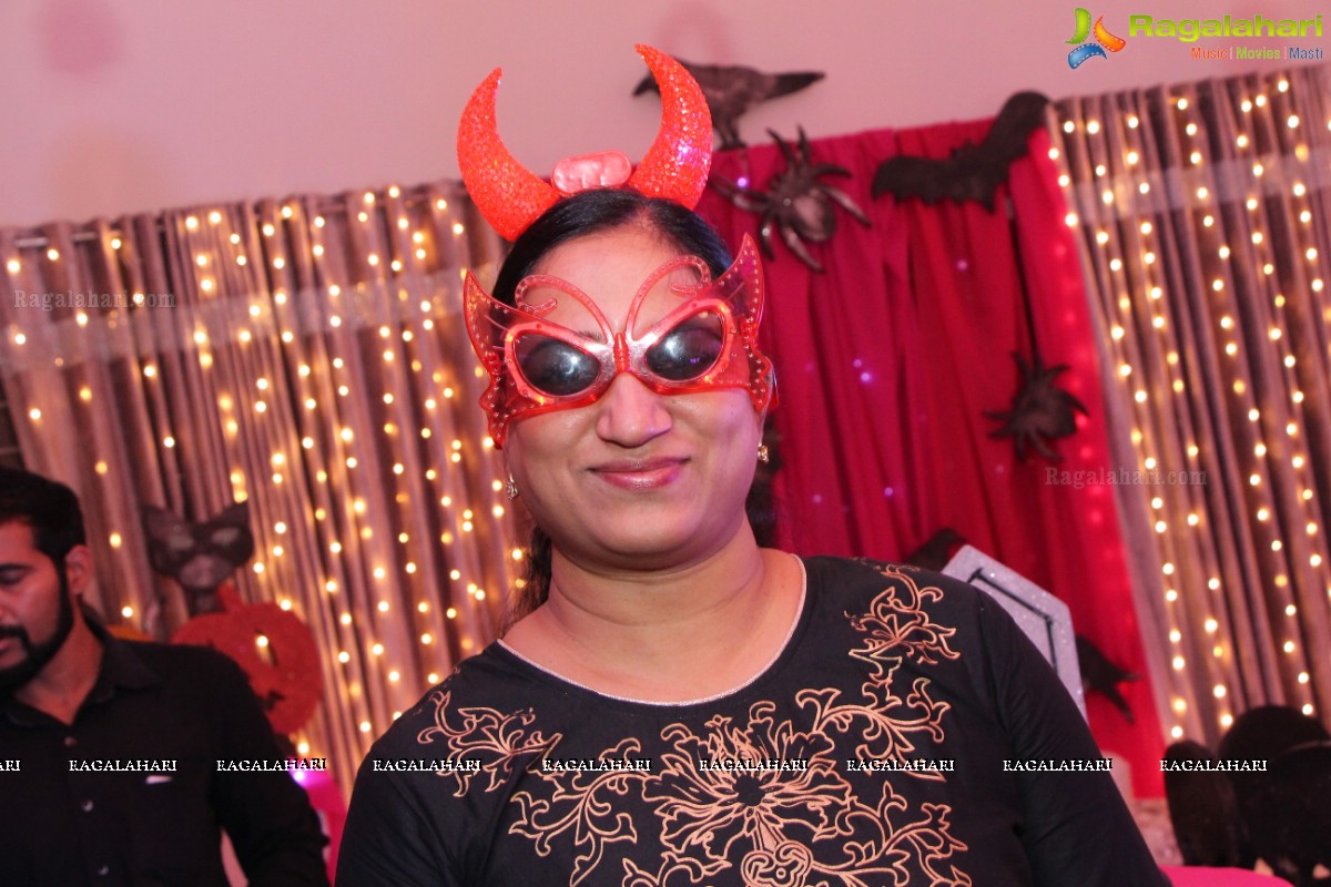 Glamorous Pink and Black Halloween Night by Madan and Preethi Rao, Hyderabad