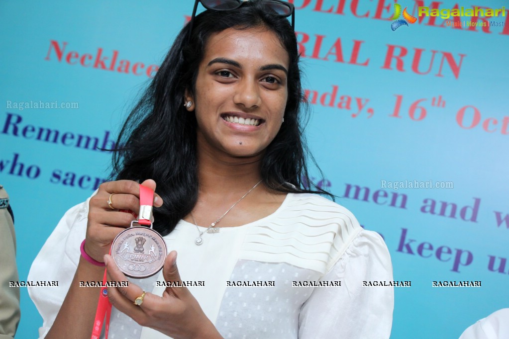 PV Sindhu unveiled T-Shirts and Medals of First Indian Police Martys Memorial Run, Hyderabad