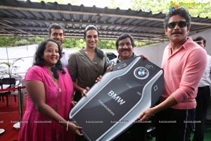 P V Sindhu Receives a BMW Car by V Chamundeswara Nath