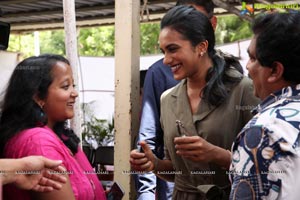 P V Sindhu Receives a BMW Car by V Chamundeswara Nath